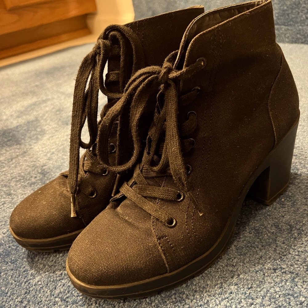 Black tie up booties with heel perfect for fall / winter occasions